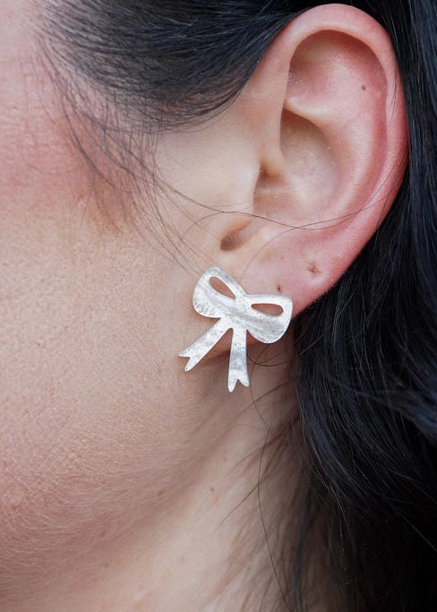 White Shimmer Bow Stud Earrings